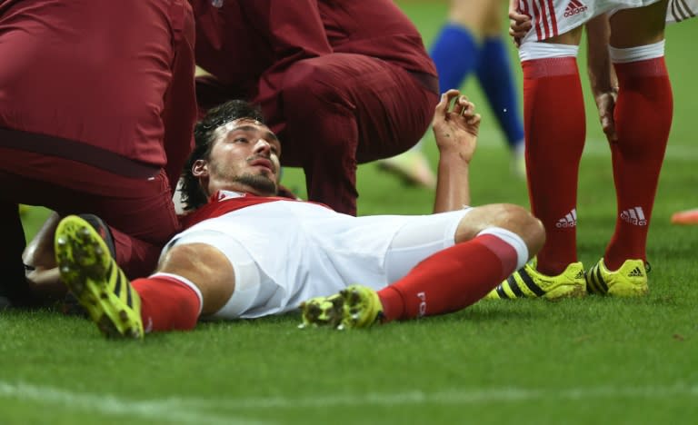 Bayern Munich's defender Mats Hummels lays injured during the Champions League group D football match between Bayern Munich and Rostov in Munich, southern Germany, on September 13, 2016