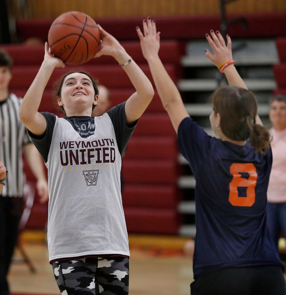 Ava McCray scores the first basket for Weymouth as the Weymouth High Unified Basketball team hosts Walpole on Monday, Oct. 3, 2022.