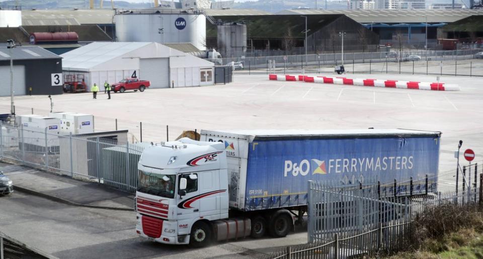 A lorry leaves a Brexit checking facility at Belfast Port (PA (PA Archive)