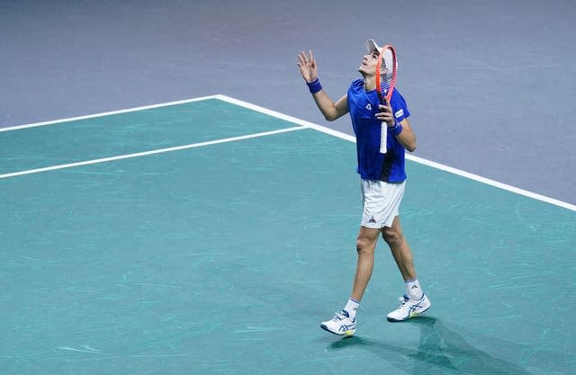 Matteo Arnaldi looks up after defeating Alexei Popyrin