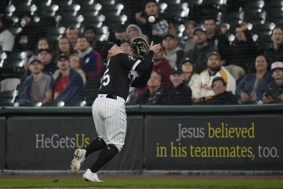 Chicago White Sox first baseman Andrew Vaughn catches a popout by Houston Astros' Mauricio Dubon during the first inning of a baseball game Friday, May 12, 2023, in Chicago. (AP Photo/Erin Hooley)