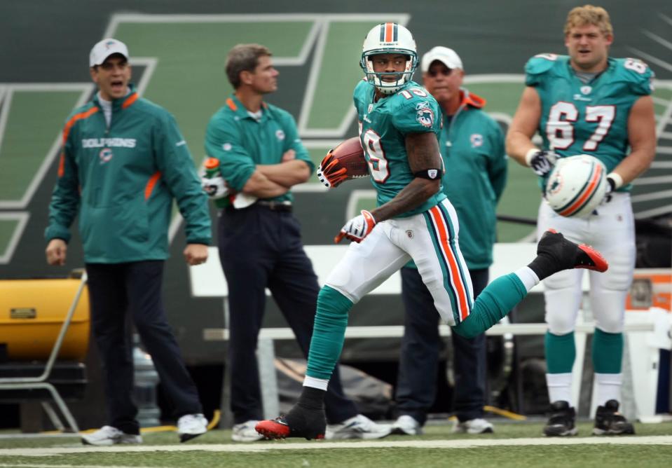 Dolphins' Ted Ginn Jr. returns his second kickoff during a game for a touchdown.