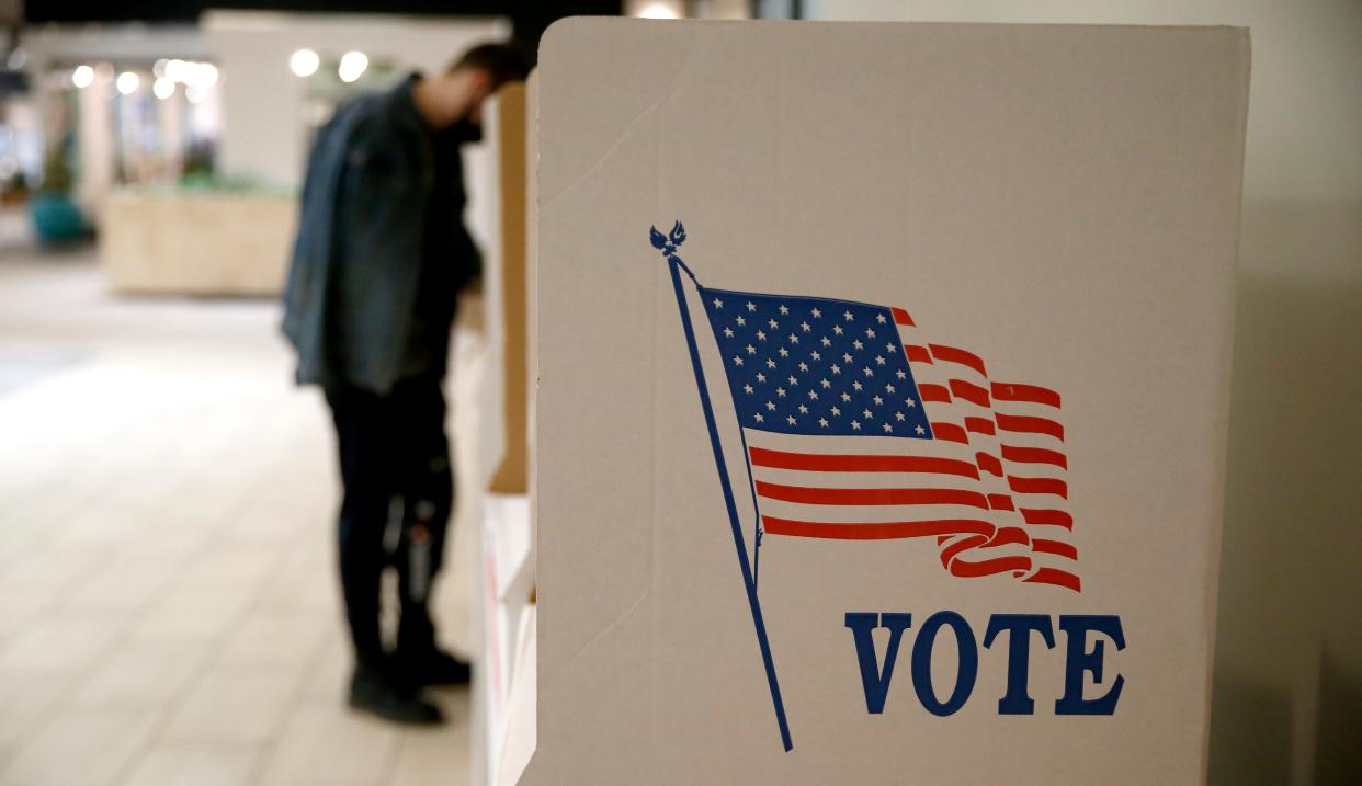 A person votes at Northpark Mall in Oklahoma City, Tuesday, Feb., 8, 2022. 