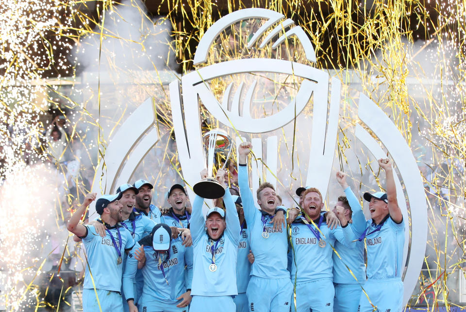 Cricket - ICC Cricket World Cup Final - New Zealand v England - Lord's, London, Britain - July 14, 2019   England's Eoin Morgan and teammates celebrate winning the world cup with the trophy   Action Images via Reuters/Peter Cziborra