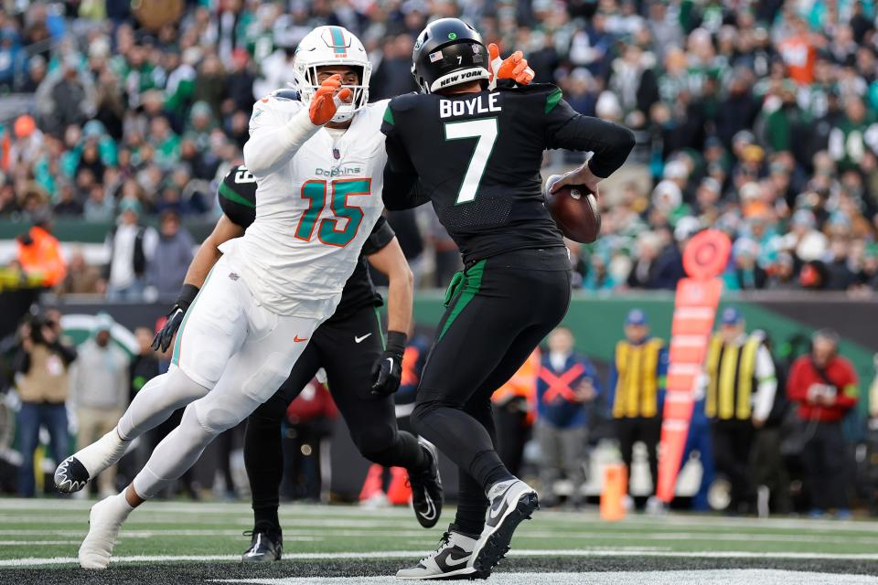 Jaelan Phillips nearly sacks the Jets' Tim Boyle for a safety.