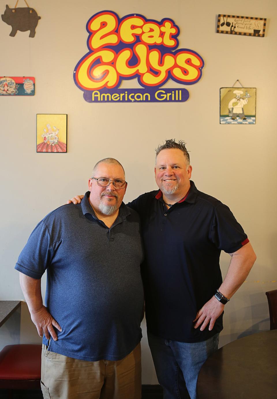 Jeff Cook, left, and Tom Craft, co-owners of 2 Fat Guys American Grill in Hockessin, are seen on April 12, 2024. The chicken wings that the business makes were voted the winner of the Delaware Wing Madness bracket challenge.