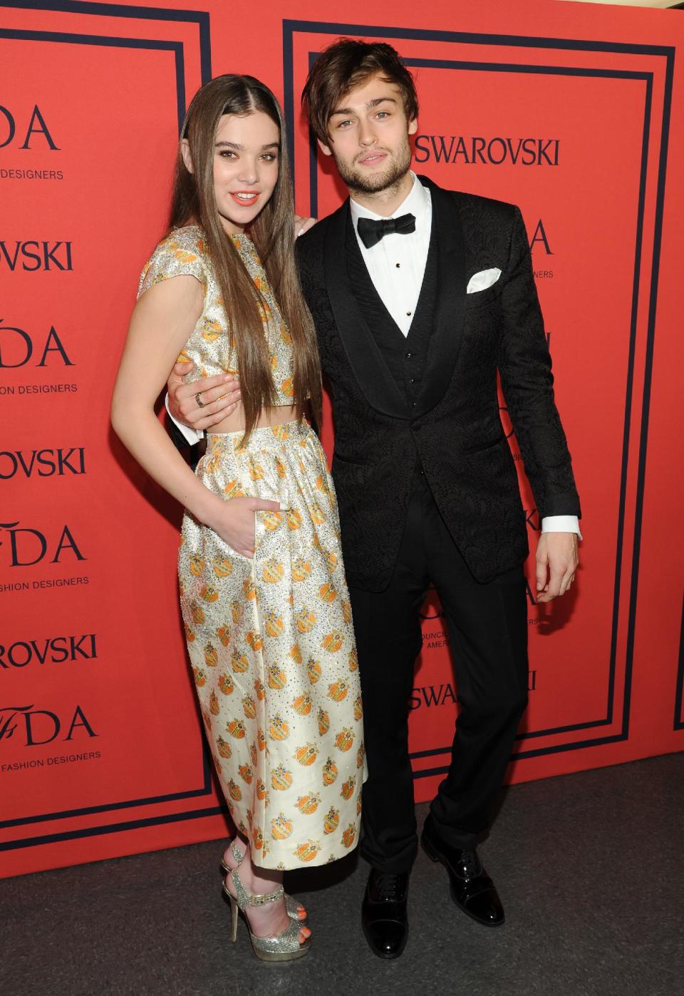 Actors Hailee Steinfeld, left, and Douglas Booth pose in the press room at the 2013 CFDA Fashion Awards at Alice Tully Hall on Monday, June 3, 2013 in New York. (Photo by Evan Agostini/Invision/AP)