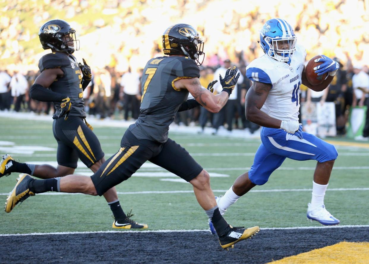 Middle Tennessee running back I'Tavius Mathers runs into the end zone for one of the Blue Raiders' six touchdowns during Saturday's game on Faurot Field. Middle Tennessee beat Missouri 51-45. It marked the most points Missouri had allowed since 2013.