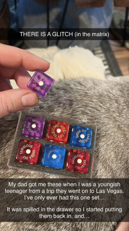 A hand holding a purple die above a set of colorful dice labeled "Fabulous Las Vegas" with the text: "My dad got me these when I was a youngish teenager ... started putting them back in, and..."