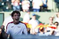 Mar 29, 2018; Key Biscayne, FL, USA; Pablo Carreno Busta of Spain celebrates after his match against Kevin Anderson of South Africa (not pictured) on day ten of the Miami Open at Tennis Center at Crandon Park. Mandatory Credit: Geoff Burke-USA TODAY Sports