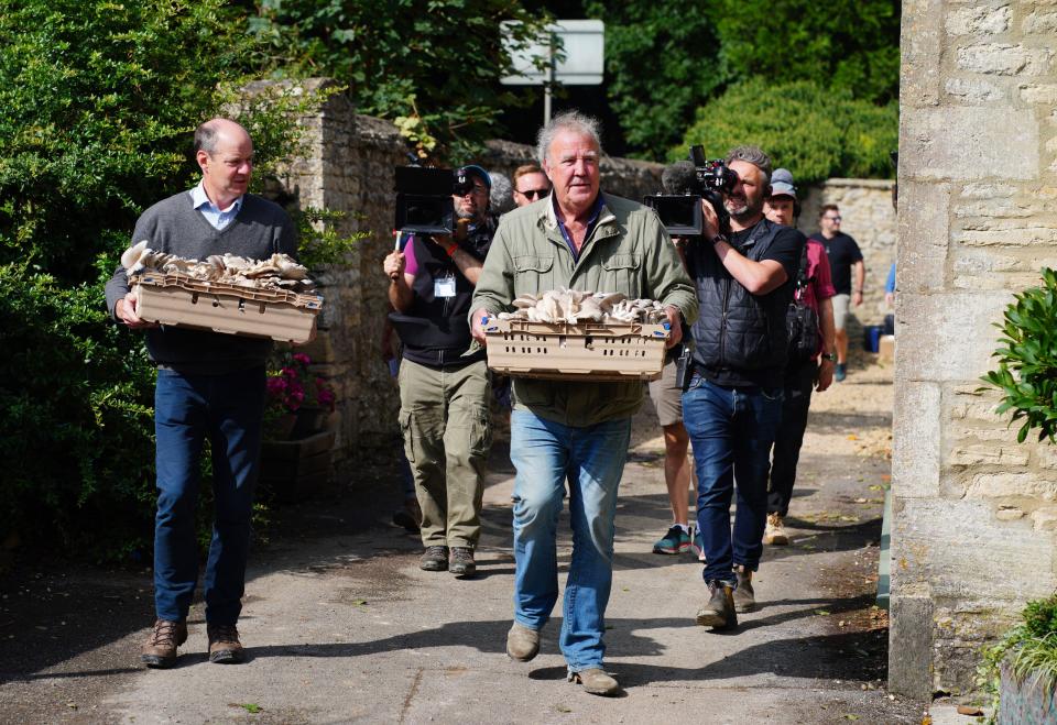 Jeremy Clarkson carrying mushrooms at the opening of his new pub, The Farmer's Dog, in Asthall, near Burford in Oxfordshire. Picture date: Friday August 23, 2024.