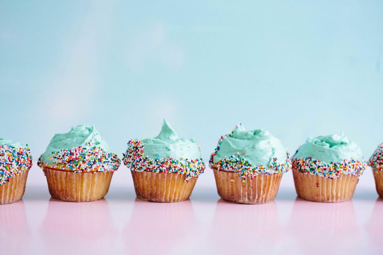 Close-Up Of Cupcakes Against Wall