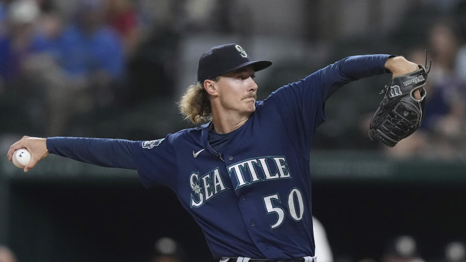 Seattle Mariners starting pitcher Bryce Miller throws to a Texas Rangers batter during the first inning of a baseball game in Arlington, Texas, Friday, Sept. 22, 2023. (AP Photo/LM Otero)