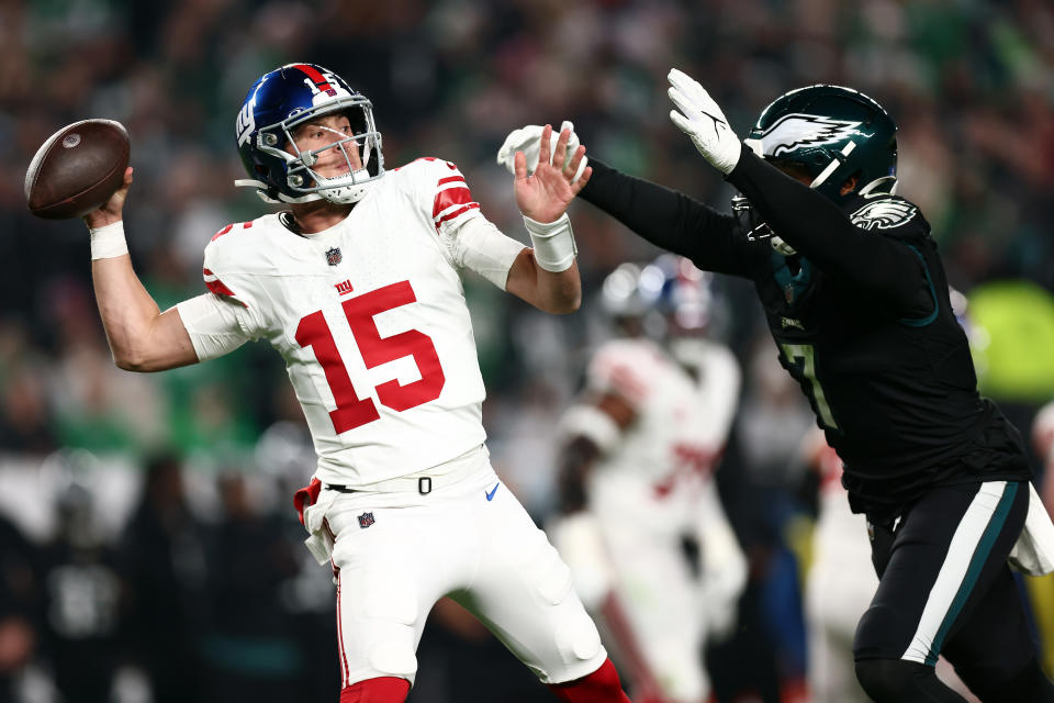 PHILADELPHIA, PENNSYLVANIA – DECEMBER 25: <a class="link " href="https://sports.yahoo.com/nfl/players/40533" data-i13n="sec:content-canvas;subsec:anchor_text;elm:context_link" data-ylk="slk:Tommy DeVito;sec:content-canvas;subsec:anchor_text;elm:context_link;itc:0">Tommy DeVito</a> #15 of the New York Giants passes the ball against Haason Reddick #7 of the Philadelphia Eagles during the second quarter at Lincoln Financial Field on December 25, 2023 in Philadelphia, Pennsylvania. (Photo by Dustin Satloff/Getty Images)