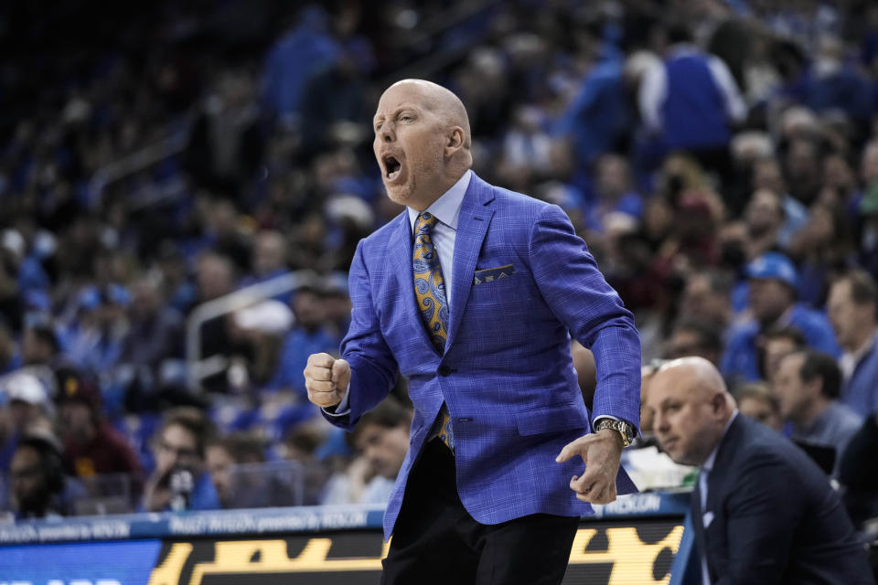 FILE - UCLA coach Mick Cronin encourages players during the first half of the team's NCAA college basketball game against Southern California in Los Angeles, Thursday, Jan. 5, 2023. Cronin is the Pac-12 coach of the year in voting released by The Associated Press, Tuesday, March 7, 2023. (AP Photo/Jae C. Hong)