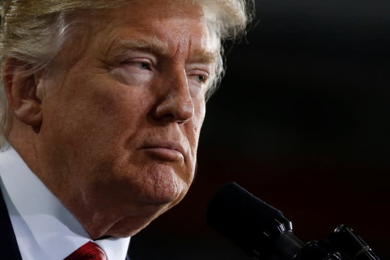 U.S. President Donald Trump delivers remarks at the American Center for Mobility for American Manufactured Vehicles in Ypsilanti Township, Michigan, U.S. March 15, 2017. REUTERS/Jonathan Ernst 