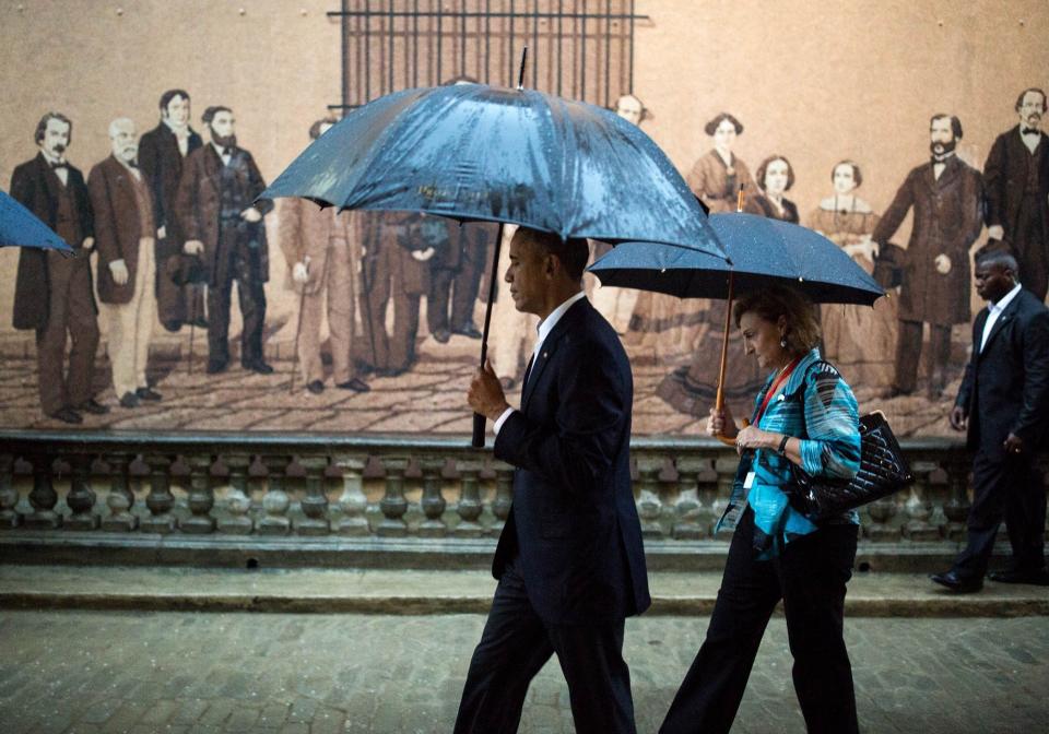 Obama walks through Old Havana.