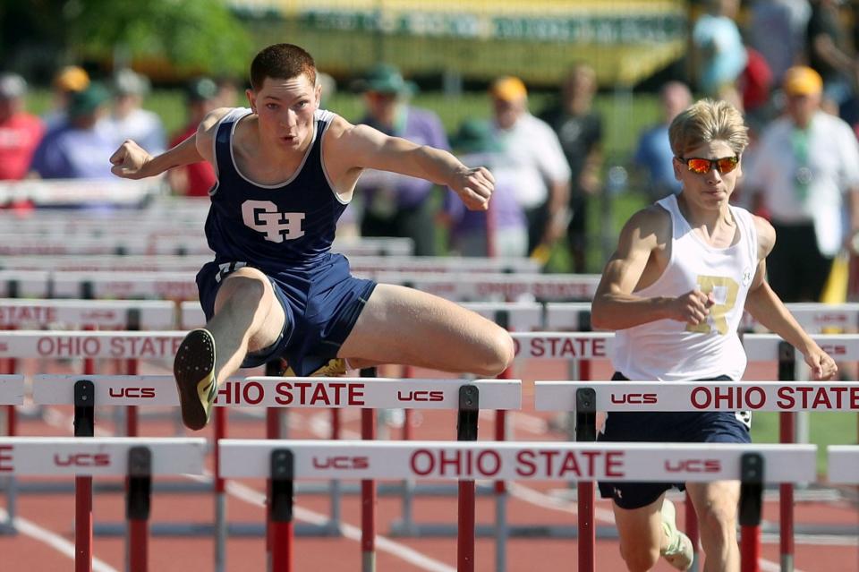 Grandview Heights' Collin Haj Abed and Lowellville's Michael Ballone compete in the 110 meter hurdles during the OHSAA Division III State Track and Field Tournament on June 4 at Ohio State University's Jesse Owens Memorial Stadium in Columbus. Haj Abed placed first in the event.