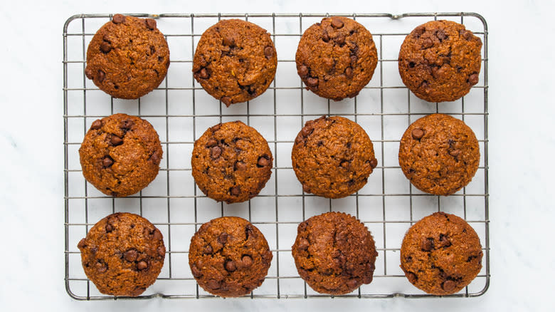 Chocolate chip carrot muffins on wire rack