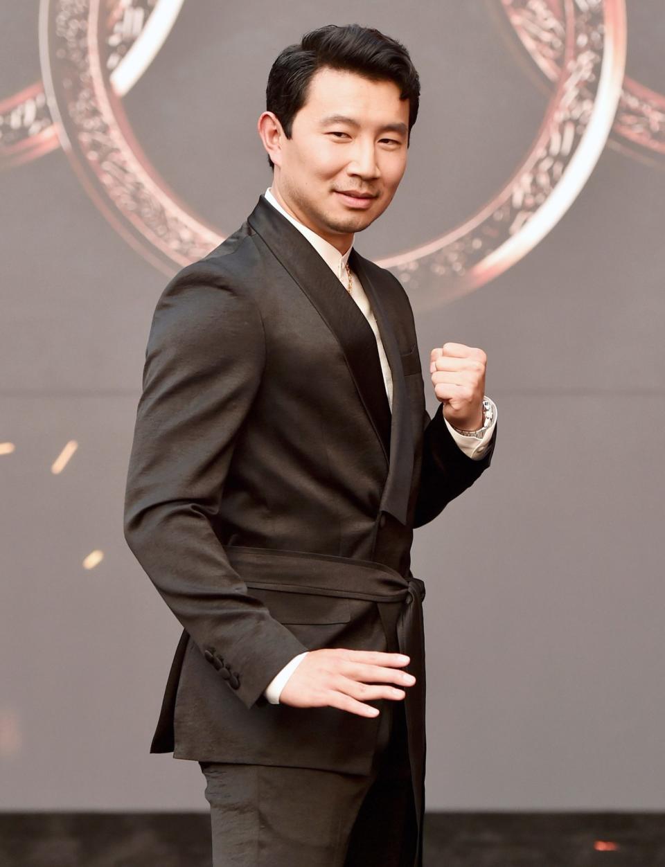 <p>Simu Liu attends the <em>Shang-Chi and the Legend of the Ten Rings</em> world premiere at El Capitan Theatre on Aug. 16 in L.A.</p>