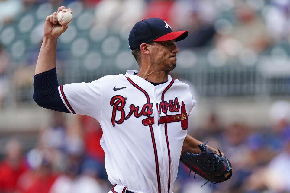 Atlanta Braves starting pitcher Charlie Morton works in the first inning of a baseball game against the New York Mets, Wednesday, July 13, 2022, in Atlanta. (AP Photo/John Bazemore)
