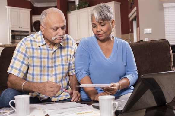 Older couple looking at documents