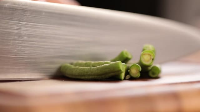 Cutting long beans with a knife