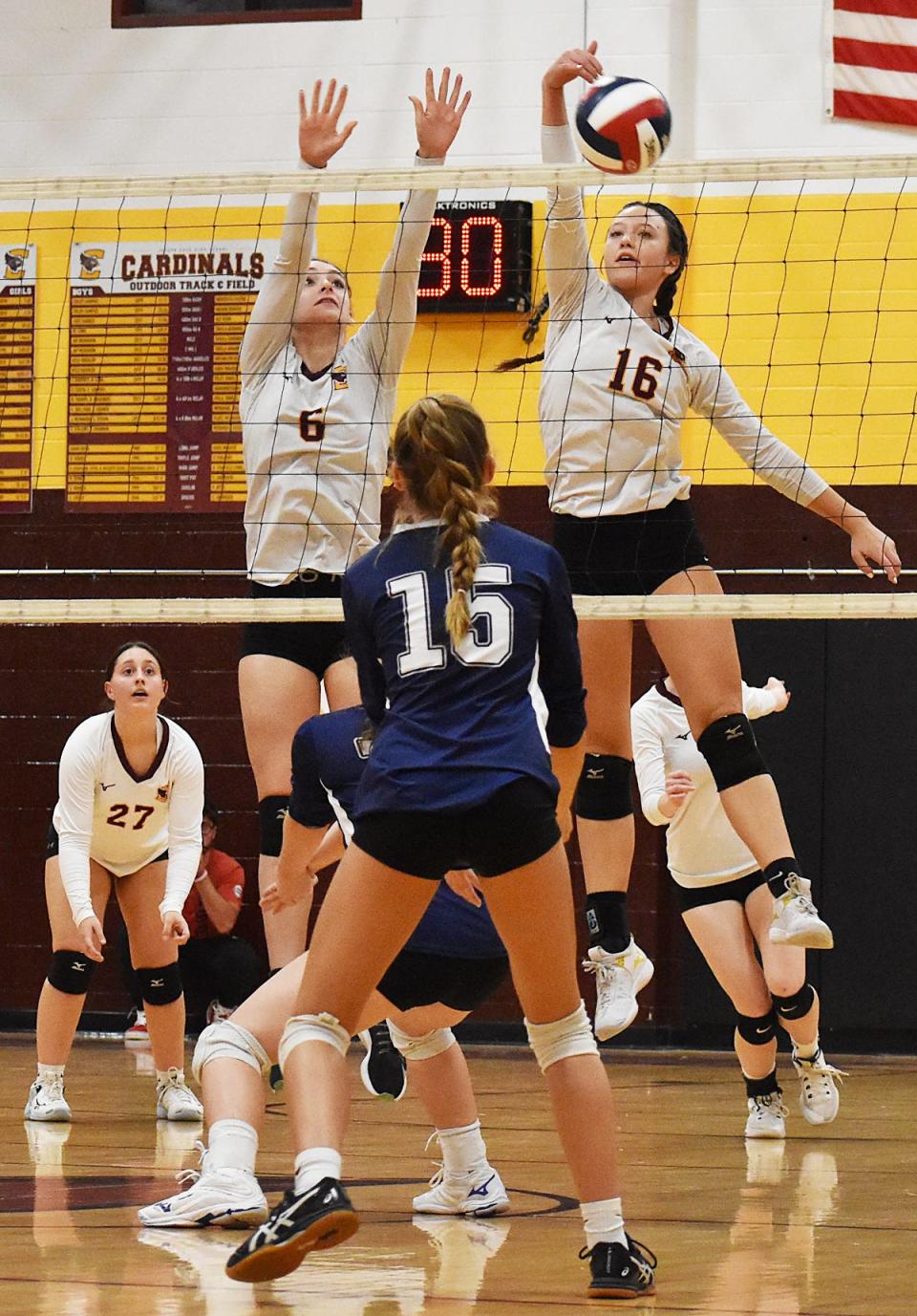 Case's Hannah Storm, right, hits the kill shot toward Sandwich's Grace Loewen.