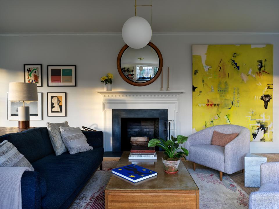 In the living room, framed artworks by Joan Miró, among others, and an Ali Beletic painting from Tappan collective; lounge chairs by Interior Define.