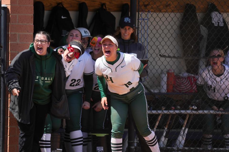 Pendleton Heights Arabians players cheer on their team against the Penn Kingsmen during the Carmel Softball Invitational on Saturday, April 20, 2024, at the Cherry Tree Softball Complex in Carmel, Indiana.