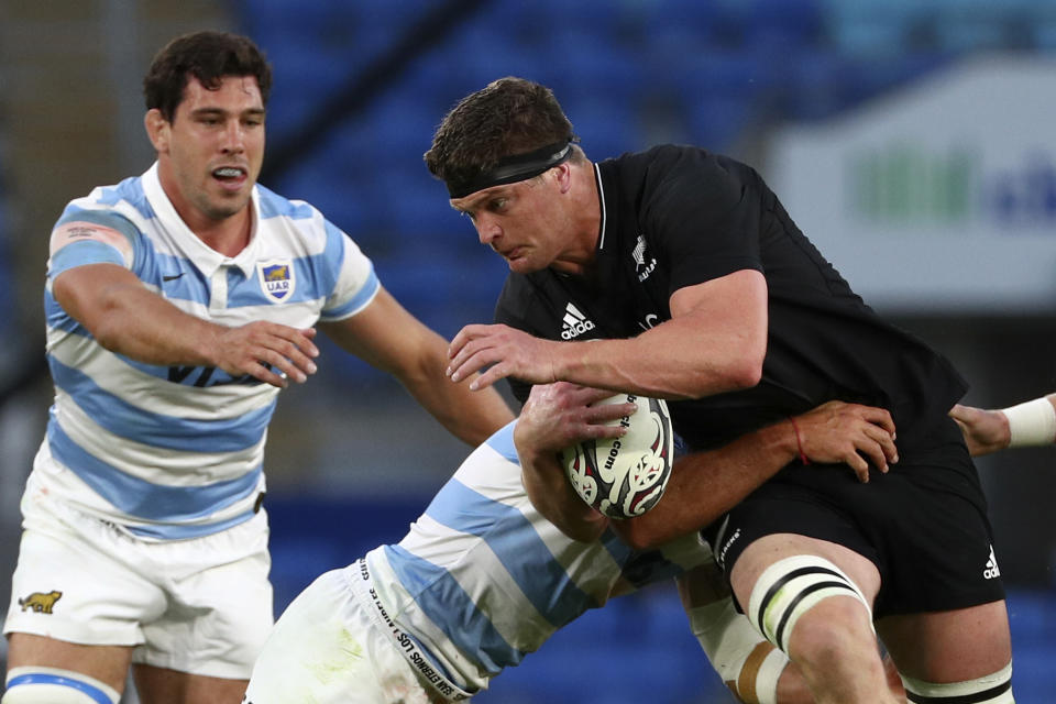 New Zealand's Scott Barrett, right, is tackled by Argentina's Pablo Matero during their Rugby Championship match on Sunday, Sept. 12, 2021, on the Gold Coast, Australia. (AP Photo/Tertius Pickard)