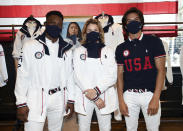 Athletes Daryl Homer (Fencing), from left, Jordyn Barratt (Skateboard) and Heimana Reynolds (Skateboard) participate in the Team USA Tokyo Olympic closing ceremony uniform unveiling at the Ralph Lauren SoHo Store on April 13, 2021, in New York. Ralph Lauren is an official outfitter of the 2021 U.S. Olympic Team. (Photo by Evan Agostini/Invision/AP)