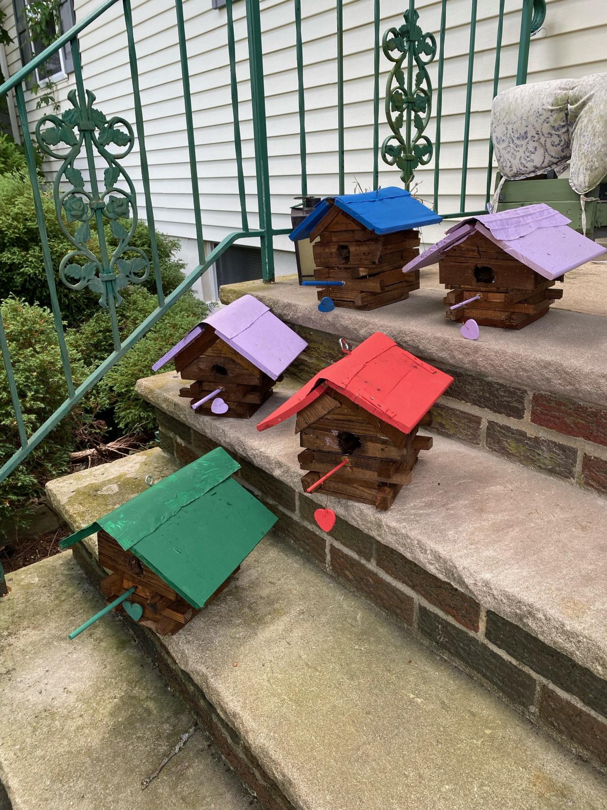 Known for his brightly colored log cabin birdhouses, James Sodano said he makes then because "they make people happy."