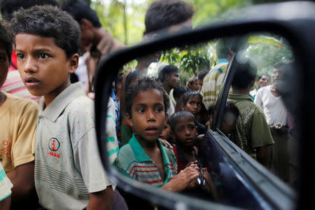 Rohingya Muslim boys stand in U Shey Kya village outside Maungdaw in Rakhine state, Myanmar October 27, 2016. REUTERS/Soe Zeya Tun