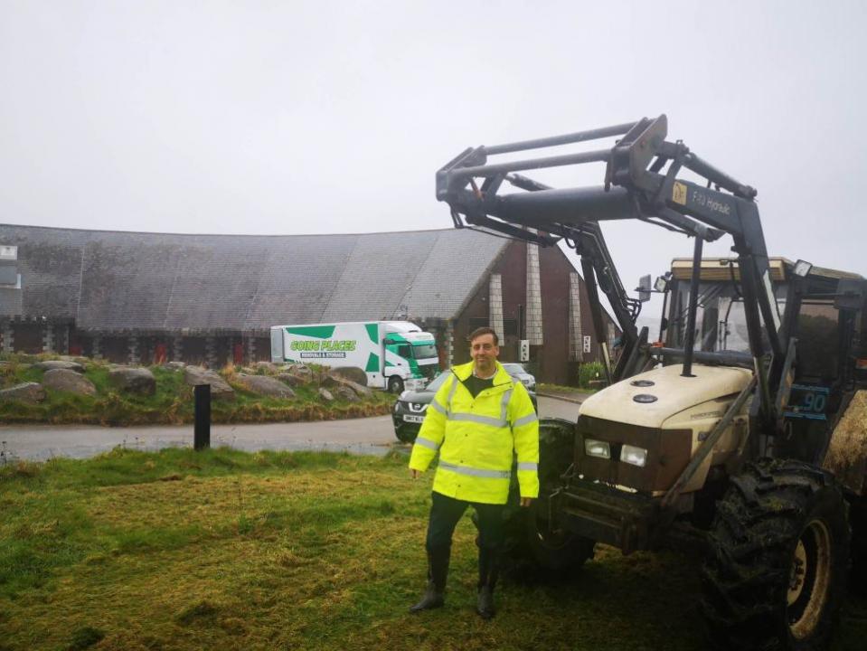 Falmouth Packet: Cllr Alan Jewell turned up to help with the big tidy up with his tractor