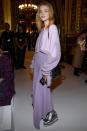 <p><strong>2 October</strong> Natalia Vodianova wore a lilac two-piece outfit with silver platform shoes. </p>