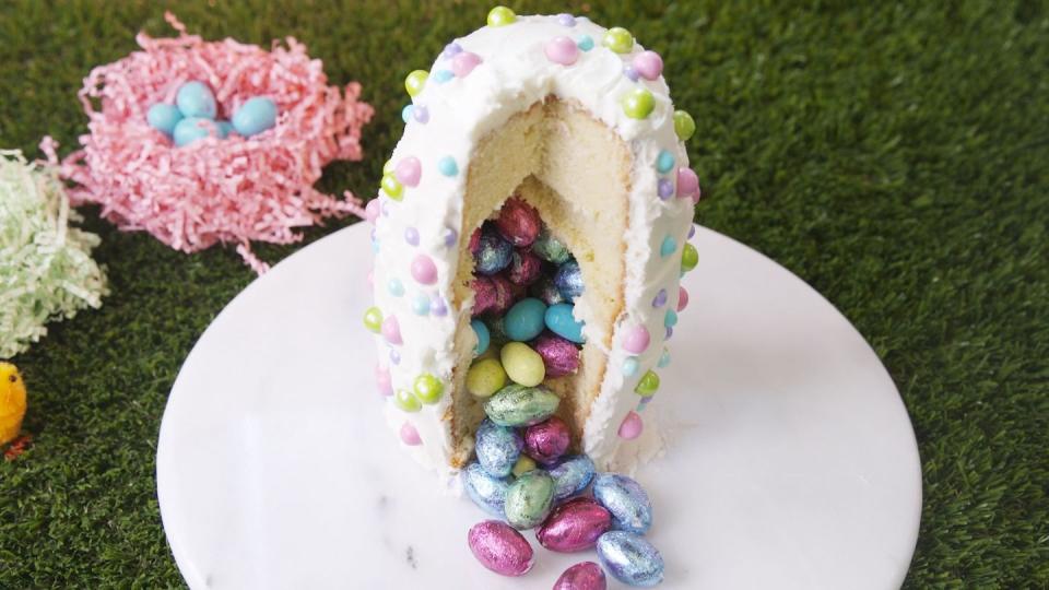 <p>Guests will love cutting into this vanilla cake to find chocolate goodies on the inside.</p><p>Get the <strong><a href="https://www.womansday.com/food-recipes/food-drinks/a54283/easter-egg-surprise-cake/" rel="nofollow noopener" target="_blank" data-ylk="slk:Easter Egg Surprise Cake recipe.;elm:context_link;itc:0;sec:content-canvas" class="link ">Easter Egg Surprise Cake recipe.</a></strong></p>