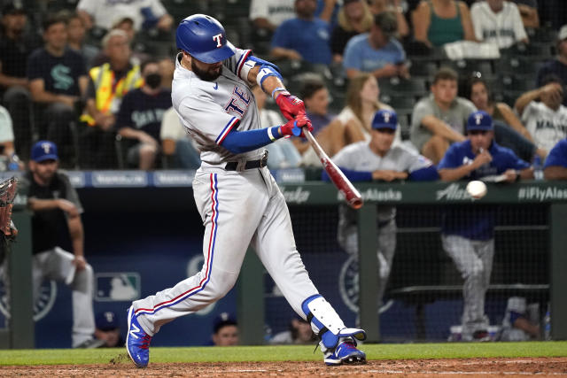 Rangers rally twice over Mariners, snap 14-game road skid