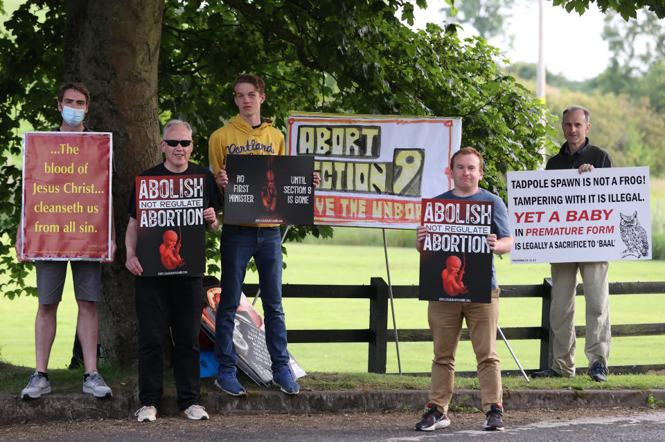 <p>Pro Life activists from Abolish Abortion NI at the La Mon hotel, Belfast, as the ruling executive of the Democratic Unionist Party (DUP) are gathering to ratify Sir Jeffrey Donaldson as the new party leader. Picture date: Wednesday June 30, 2021.</p>

