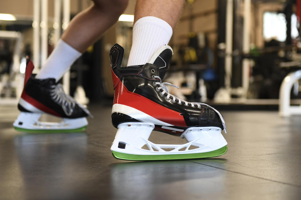 Vegas Golden Knights NHL hockey team defenseman Brayden McNabb works out in DriBlades that were developed for off-ice training for hockey players, at Kelly Riou’s Next Level Training Centre in Saskatoon, Saskatchewan, Thursday, June 16, 2022. (Jason Johnson/Alien Kinetics via AP