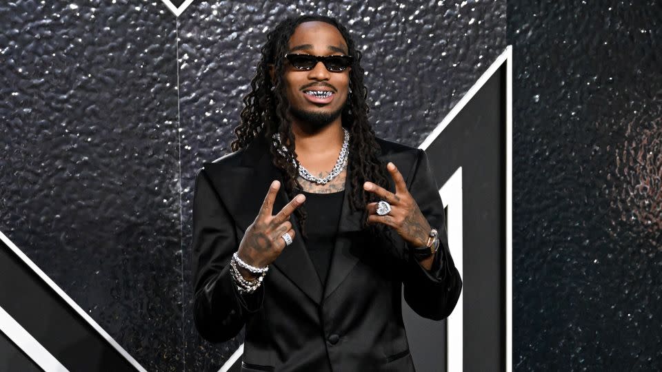 Rapper Quavo was one of the many stars to arrive wearing all-black. - Gilbert Flores/Billboard/Getty Images