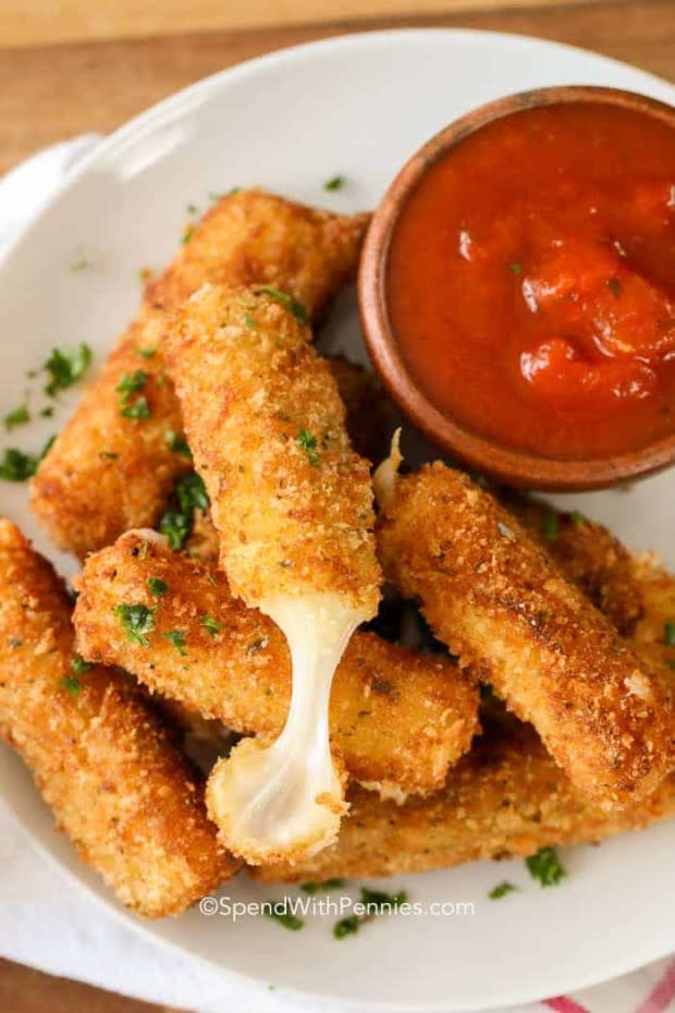 <p>Spend With Pennies</p><p>Who doesn't love an ooey gooey mozzarella stick? These can be fried or baked!</p><p><strong>Get the recipe: <a href="https://www.spendwithpennies.com/gooey-cheese-sticks/" rel="nofollow noopener" target="_blank" data-ylk="slk:Gooey Cheese Sticks;elm:context_link;itc:0;sec:content-canvas" class="link ">Gooey Cheese Sticks</a></strong></p>