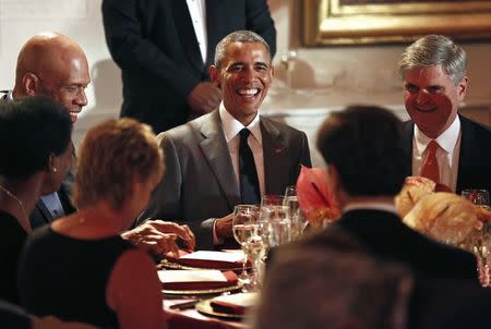 U.S. President Barack Obama (C) attends the "A Celebration of Special Olympics and A Unified Generation" event at the White House in Washington, July 31, 2014. REUTERS/Yuri Gripas