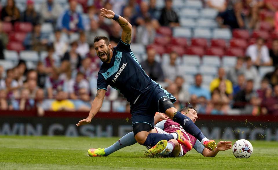 <p>Middesbrough forward Alvaro Negredo is fouled by Tommy Elphick of Villa during the pre- season friendly between Aston Villa and Middlesbrough at Villa Park on July 30, 2016 in Birmingham, England. (Photo: Stu Forster/Getty Images) </p>