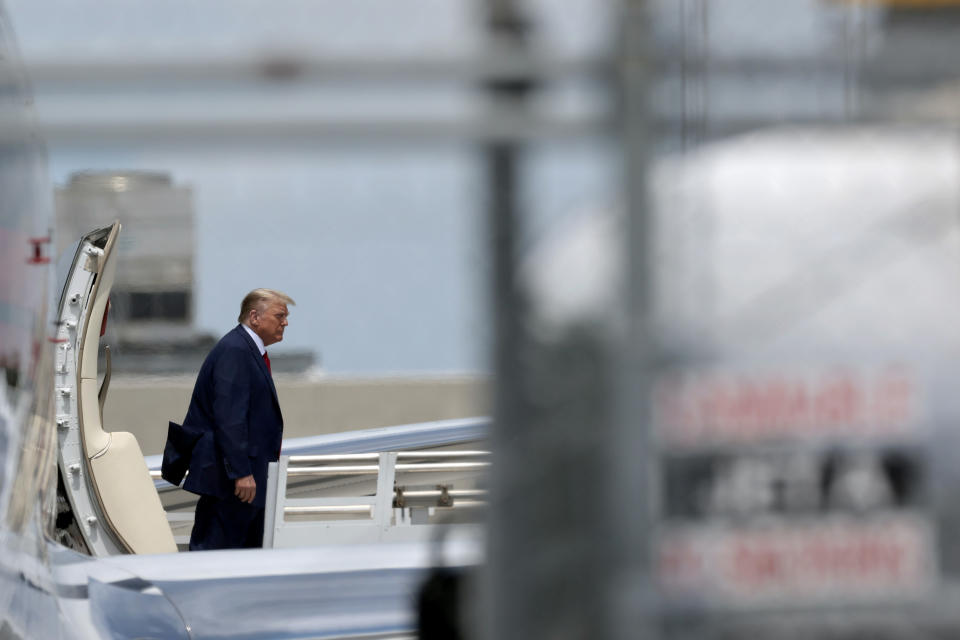 Donald Trump boarding plane.