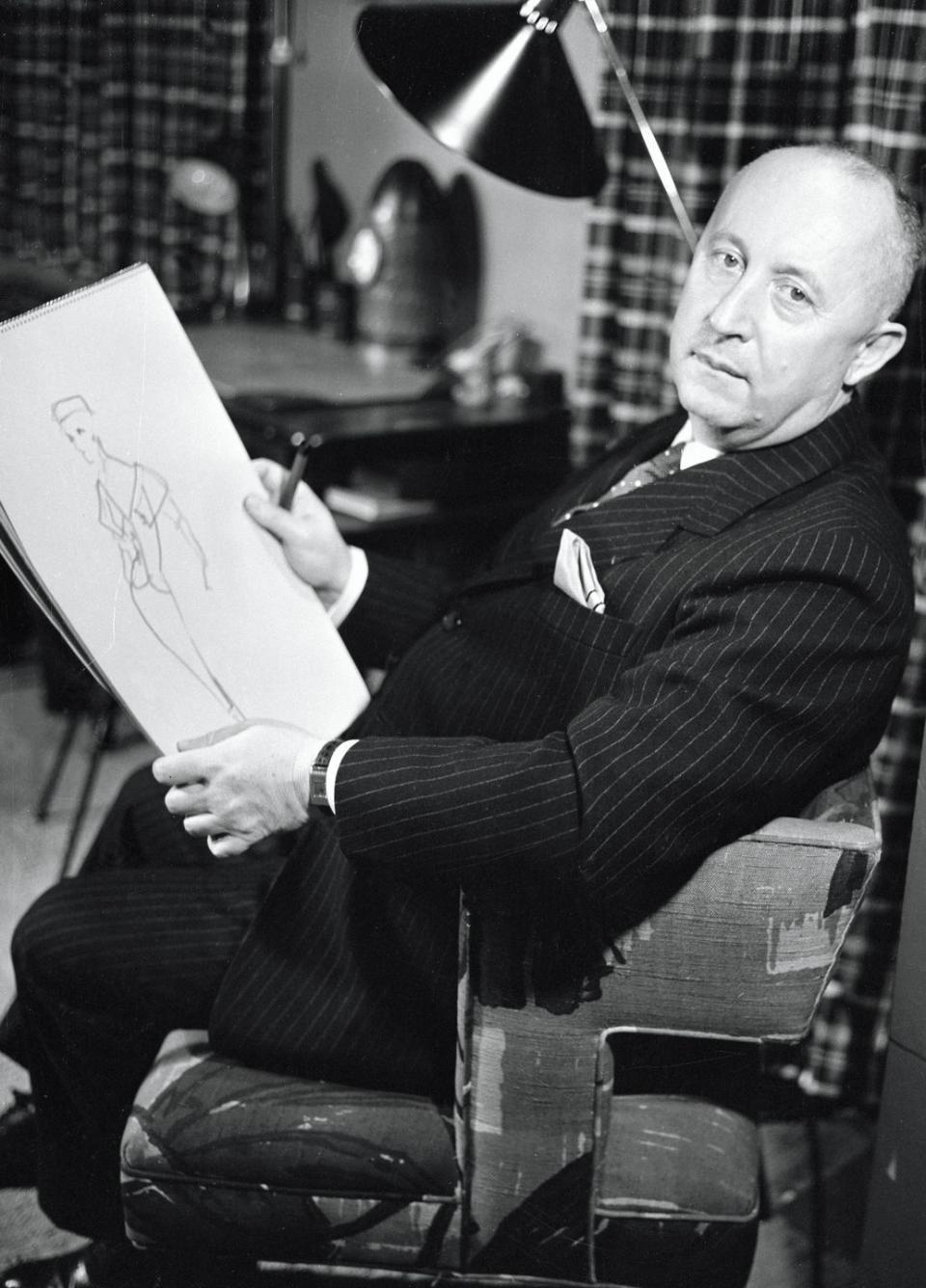 november 7, 1955 christian dior at home for person to person t858317copyright cbs broadcasting, inc, all rights reserved, credit cbs photo archive