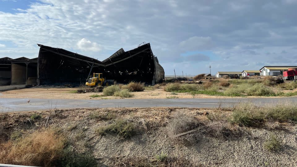 Hamas fighters torched the barns holding hay for the dairy cows on Kibbutz Alumim, riding unopposed into the settlement before massacring foreign workers and attendees of the nearby Nova music festival. - Joseph Ataman/CNN