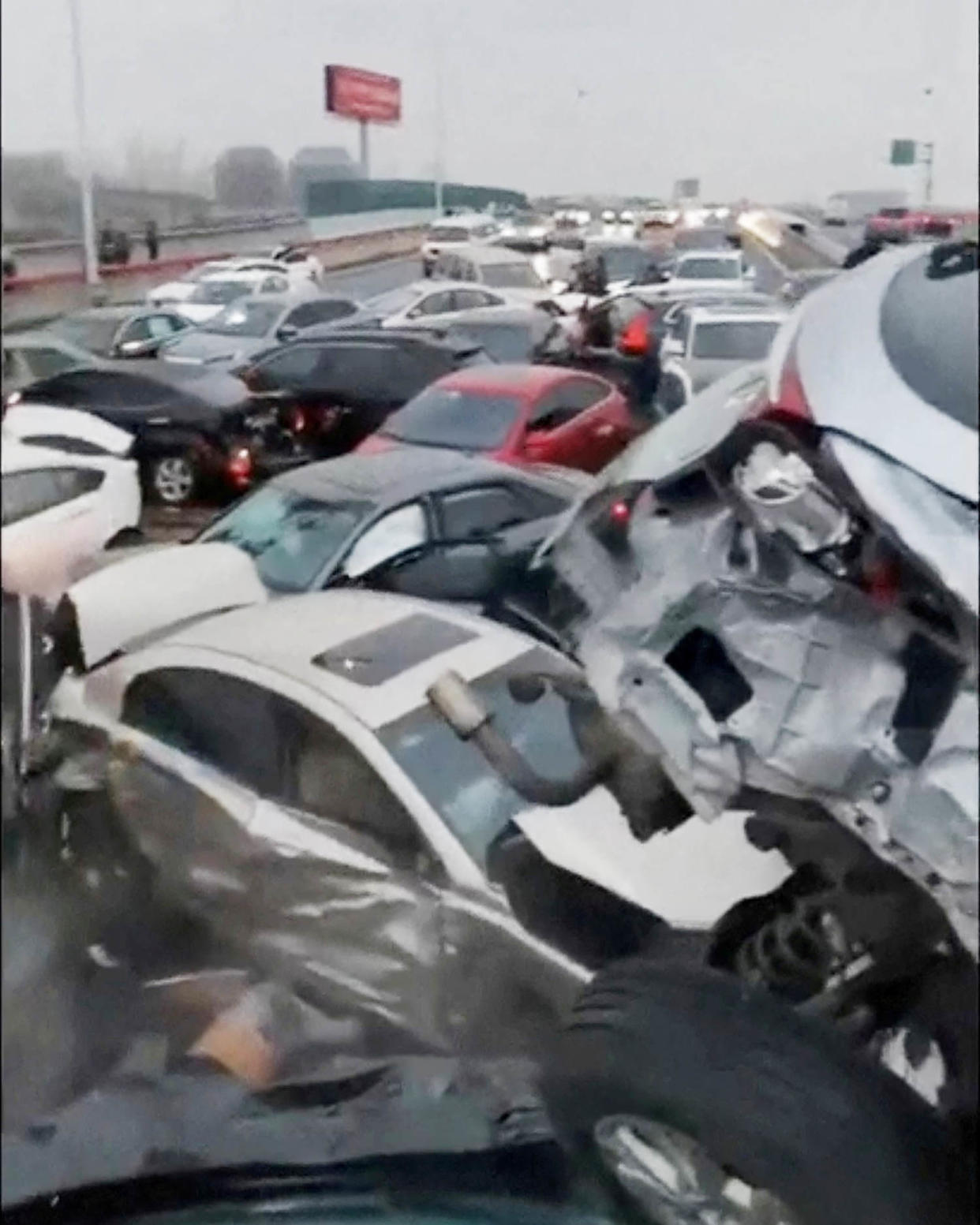 Cars pile up on an overpass during rainy and snowy weather, in Suzhou (via Reuters)