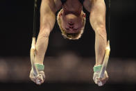 Riley Loos competes on the still rings during the men's U.S. Olympic Gymnastics Trials Thursday, June 24, 2021, in St. Louis. (AP Photo/Jeff Roberson)