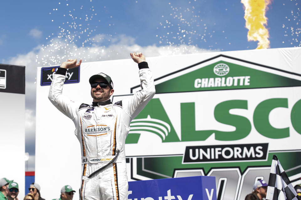 Josh Berry celebrates in Victory Lane after winning a NASCAR Xfinity auto race at Charlotte Motor Speedway on Saturday, May 28, 2022, in Concord, N.C. (AP Photo/Matt Kelley)